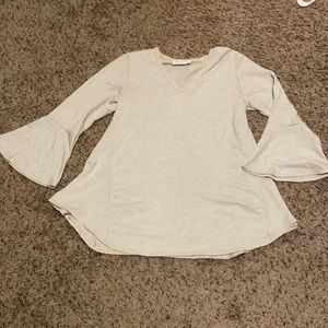 Boutique sweater. Gray/ off-white color. Size small. Flare arms. Super cute!